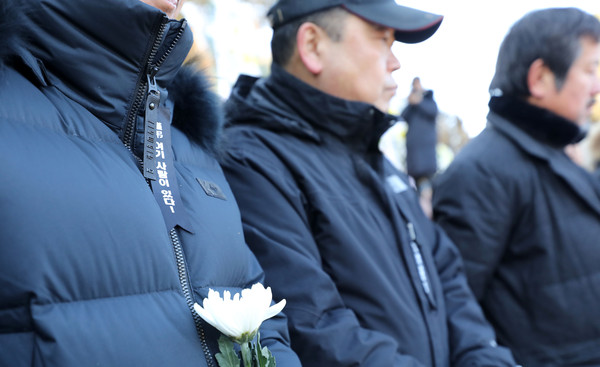 ▲ ‘용산참사 10주기 추모제’에서 추모하는 동료들.