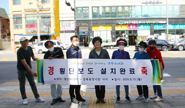 ▲ 광산사거리와 수유중앙시장의 중간지점에 횡단보도 신설 현장 찾아.