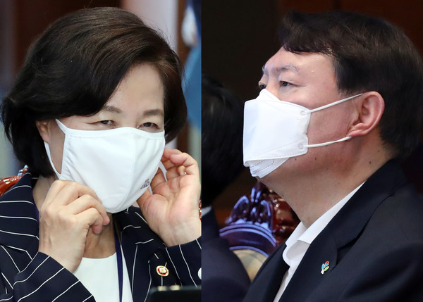 ▲ 미소짓는 추미애 법무부 장관과 굳은 표정의 윤석열 검찰총장.