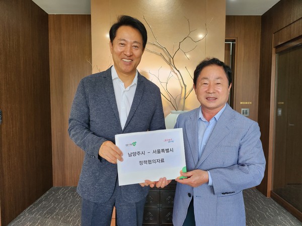 ▲ 주광덕 남양주시장(오른쪽)과 오세훈 서울시장(왼쪽).