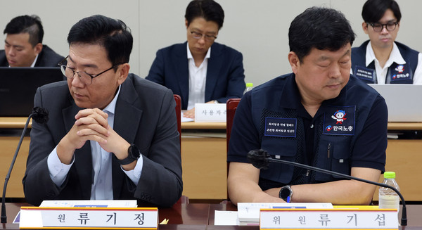▲ 지난 2일 세종시 정부세종청사에서 열린 최저임금위원회 제7차 전원회의서 류기정 사용자 위원과 류기섭 근로자 위원의 시선이 엇갈리고 있다.