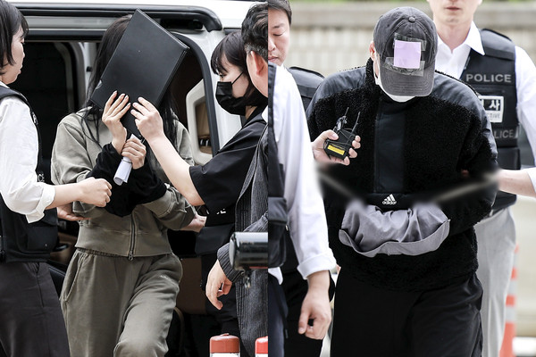 ▲ 잉글랜드 프로축구 프리미어리그 토트넘 홋스퍼 주장 손흥민을 상대로 허위 임신을 주장하며 금품을 요구한 혐의를 받는 20대 여성 양 모 씨와 40대 남성 용 모 씨가 17일 서울 서초구 서울중앙지방법원에서 열린 영장실질심사에 출석하고 있다. /뉴시스